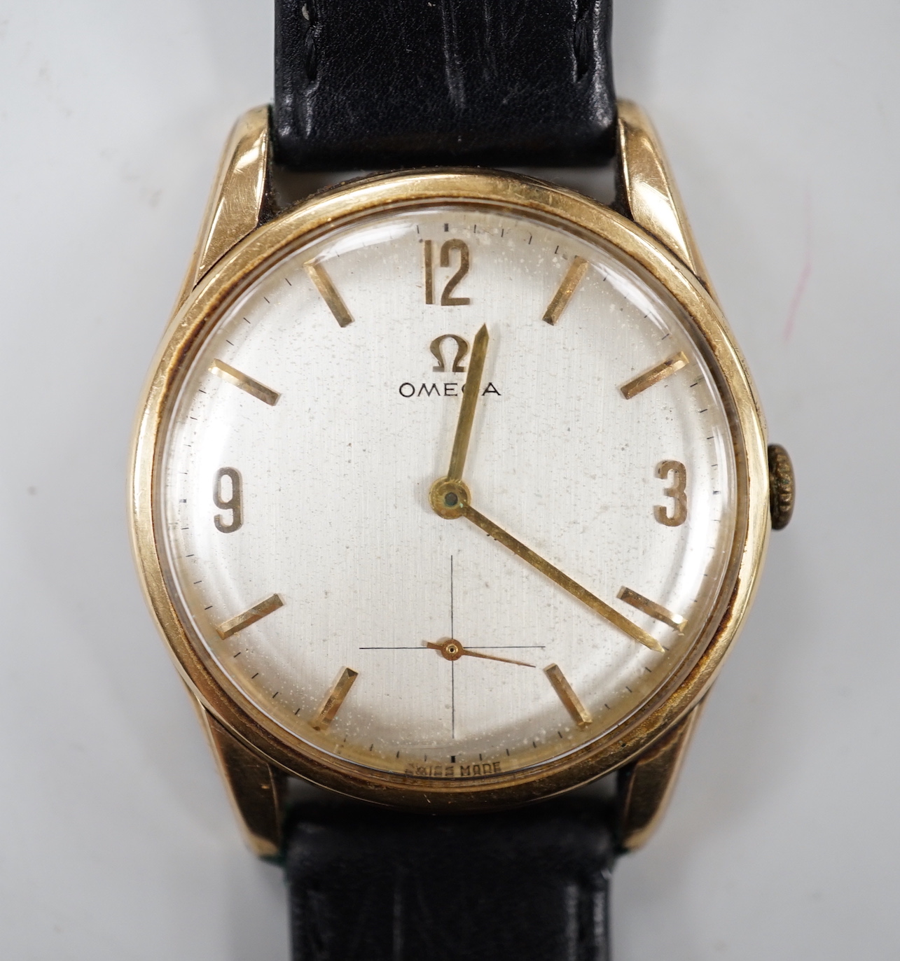 A gentleman's 1960's 9ct gold Omega manual wind wrist watch, with engraved inscription and associated strap, case diameter 34mm, movement c.269.